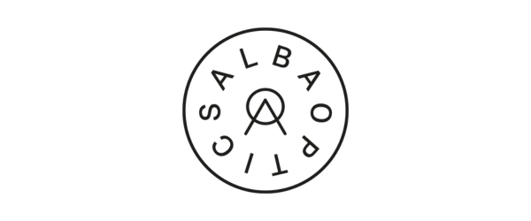 A circular logo with the letters 